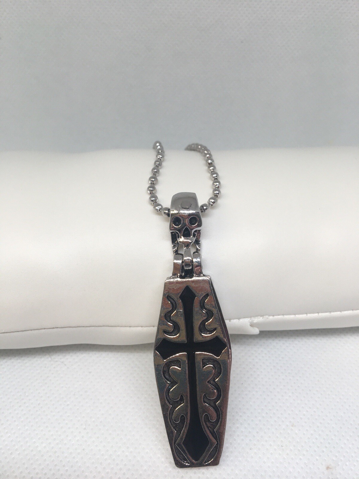 Feeling ghoulish? This coffin necklace is for you. Opens to skeleton remains.