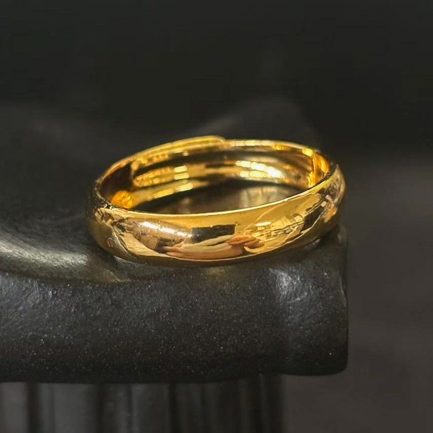 Simple Band Ring Gold-plated (NOT SURE) marked ‘ 999 ‘, Size 9 adjustable