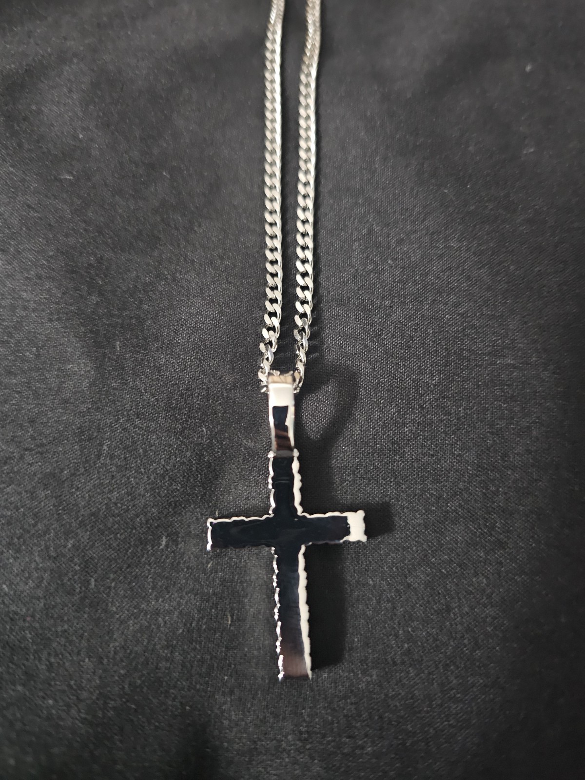 20in. 2.4mm stainless stl chain w/ a Silver plated Cross Pendant 11 prong set CZ