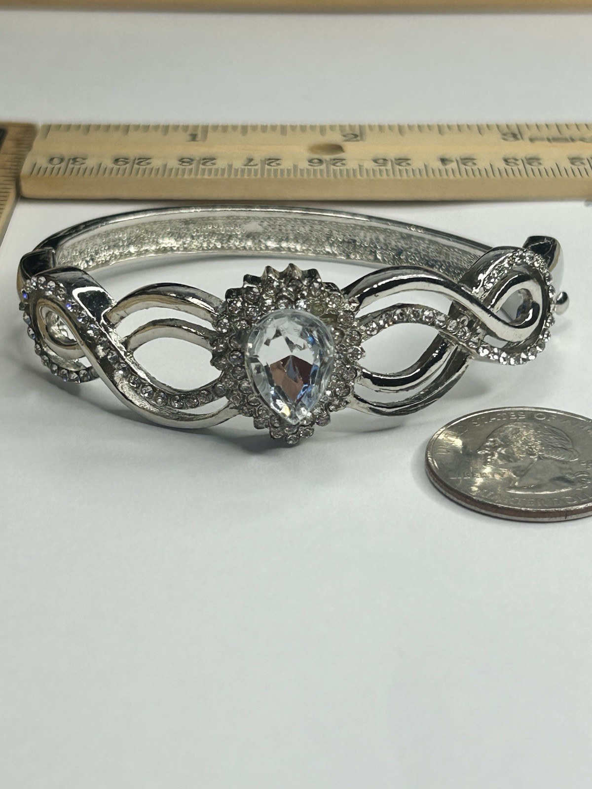 Silver Tone Bangle Bracelet Push Lock Pear Shaped Clear Crystal Center Stone