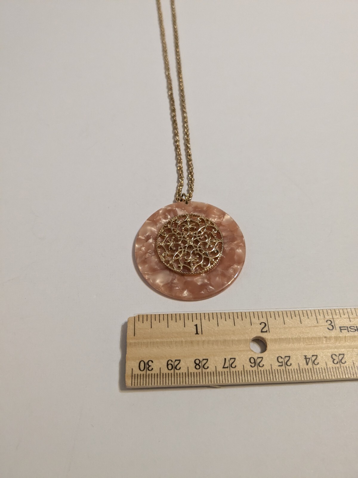 Peach Faux Shell Medallion Pendant Gold Tone Necklace. Metal Scroll Work. 30″.