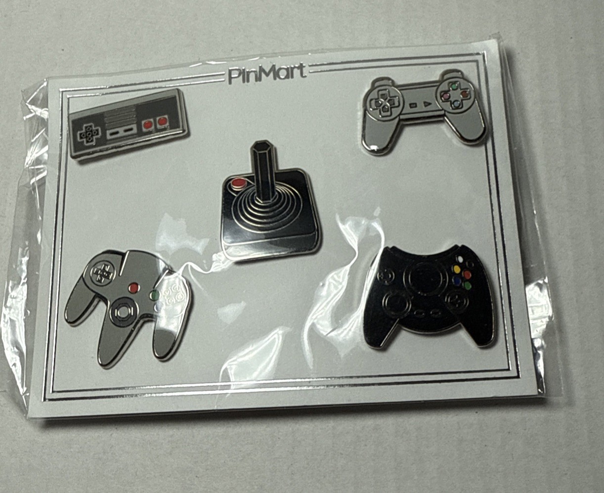 PinMart’s Retro Video Gaming Controller Enamel Lapel Pin Set