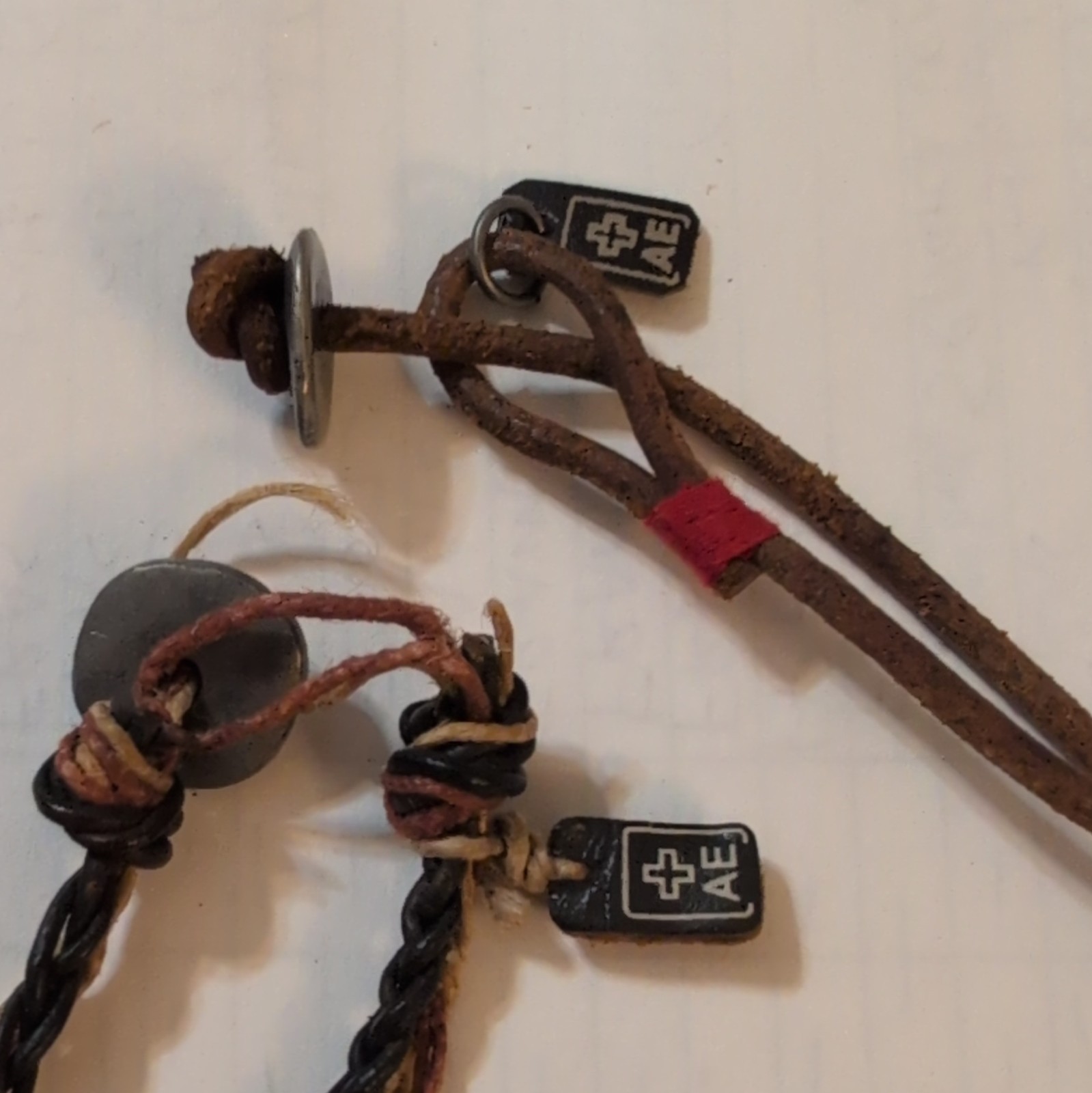 AE Two Brown And Black Leather Cord Necklace Cross Charm Pendant Tie Closure