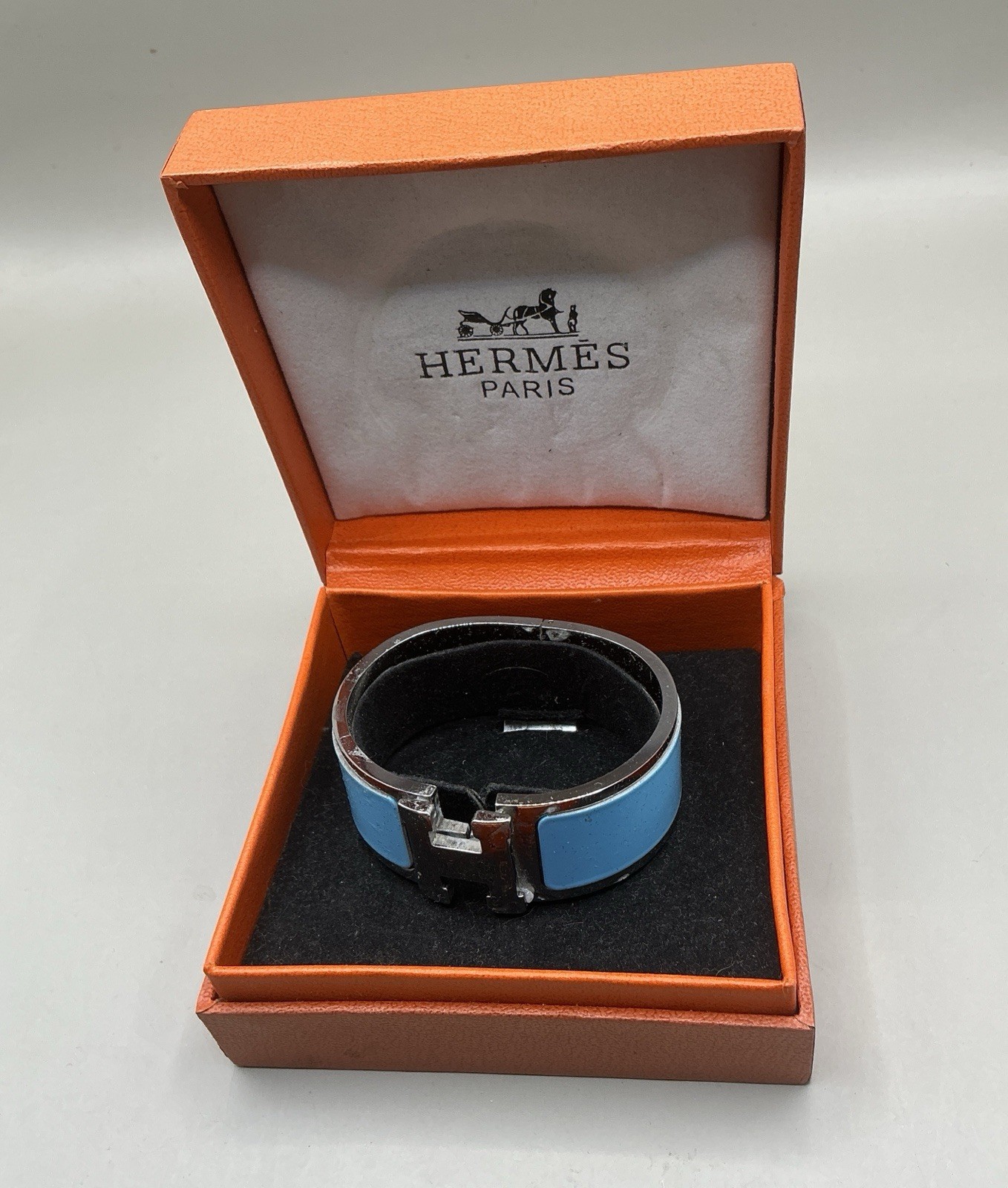 Pre Loved Hermès Clic H bracelet light blue enamel palladium-plated PETITE MODEL