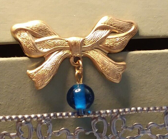 42mm Brass Stamping Ribbon Lapel/Pin Brooch W/10mm Blue Dangle 06-01-2023