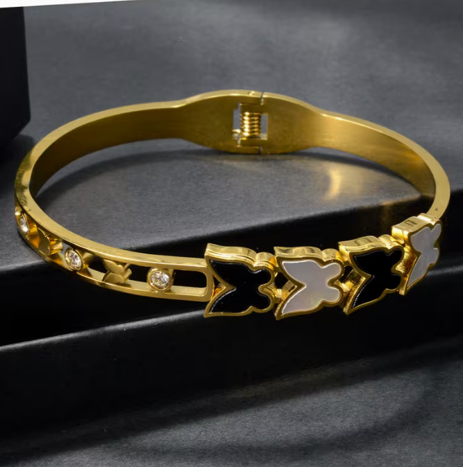 Exquisite Geometric Black and White Butterfly-Accented Stainless Steel Bracelet