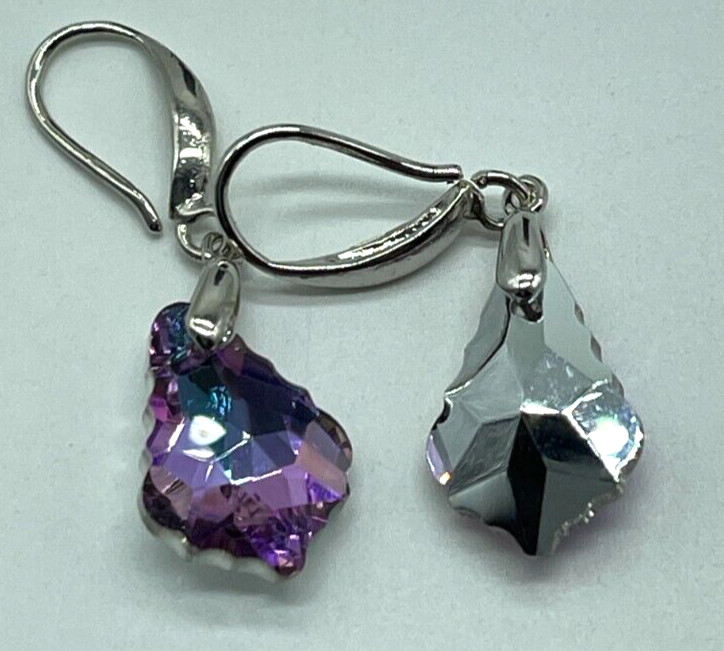 Earrings. Silver Tone with Pinkish Purple Reflective Crystal. Hook. 1″ drop