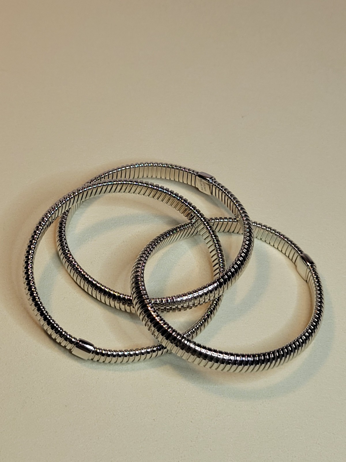 David Markstein Silvertone Three Strand Slip On Tubogas 8″ Stretch Bracelet