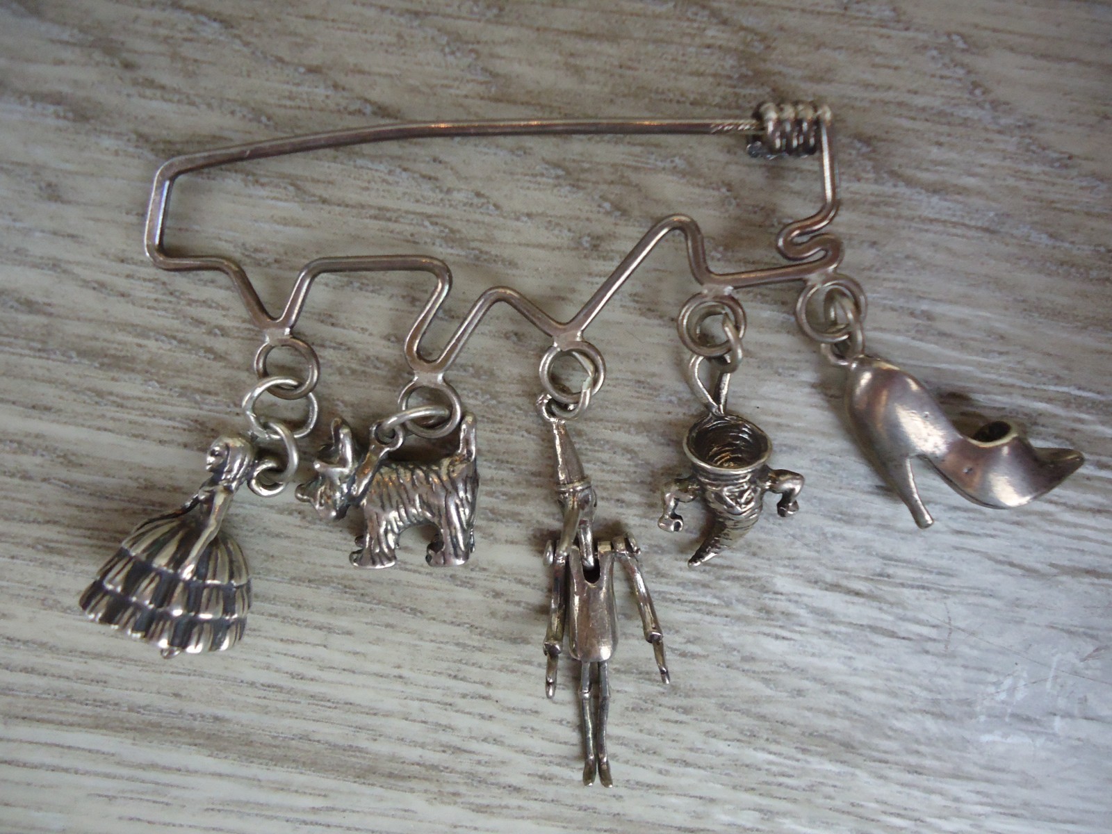 Wizard Of Oz Silver Charm Pin Articulated Tin Man Dorothy Tornado Todo Slipper