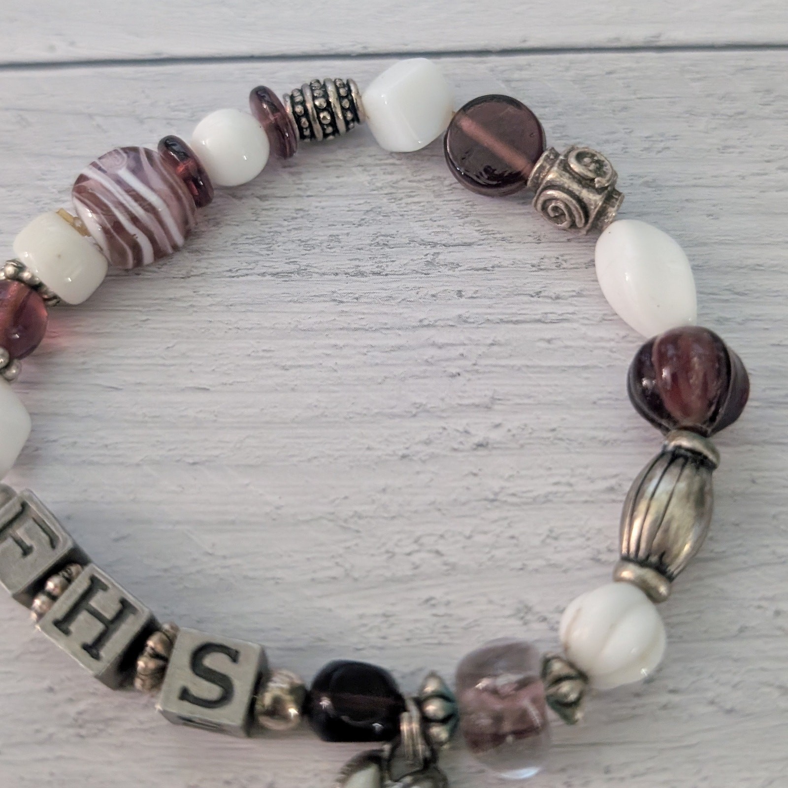 FHS with Paw Charm Stretch Bracelet – Fair Condition