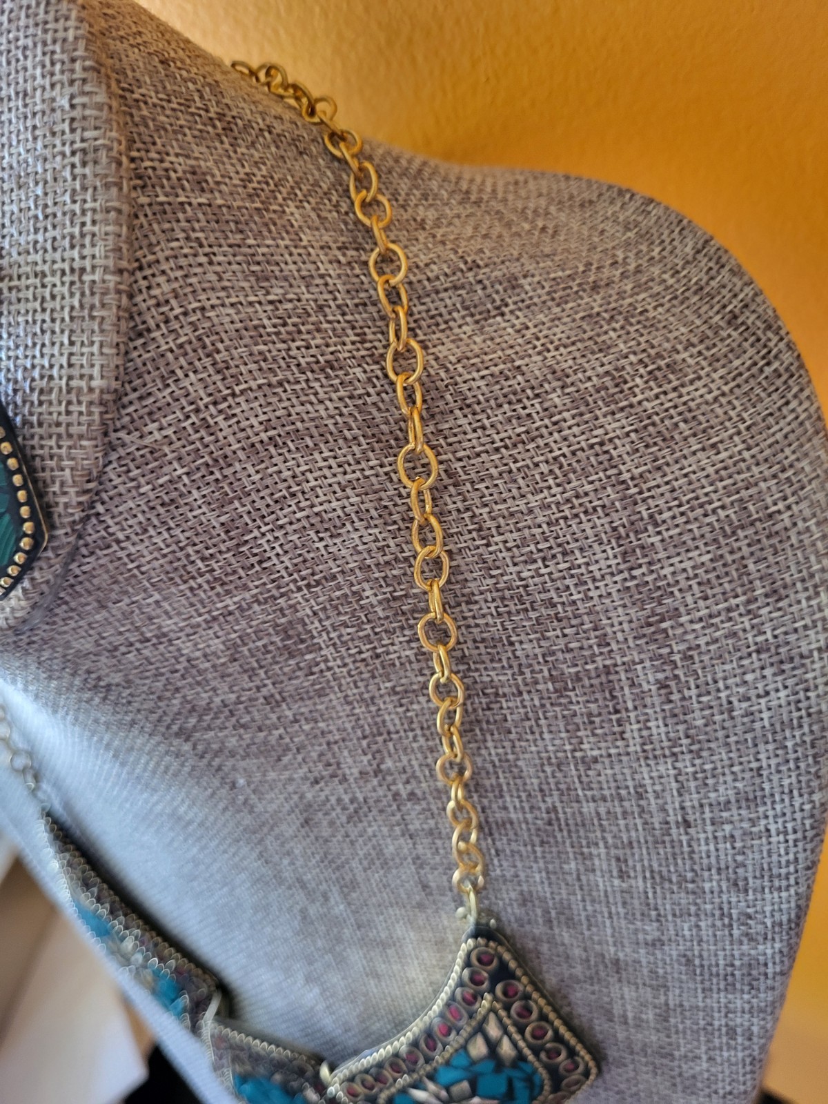 Tibetan-style solid brass bib necklace inlaid turquoise-like blue stones