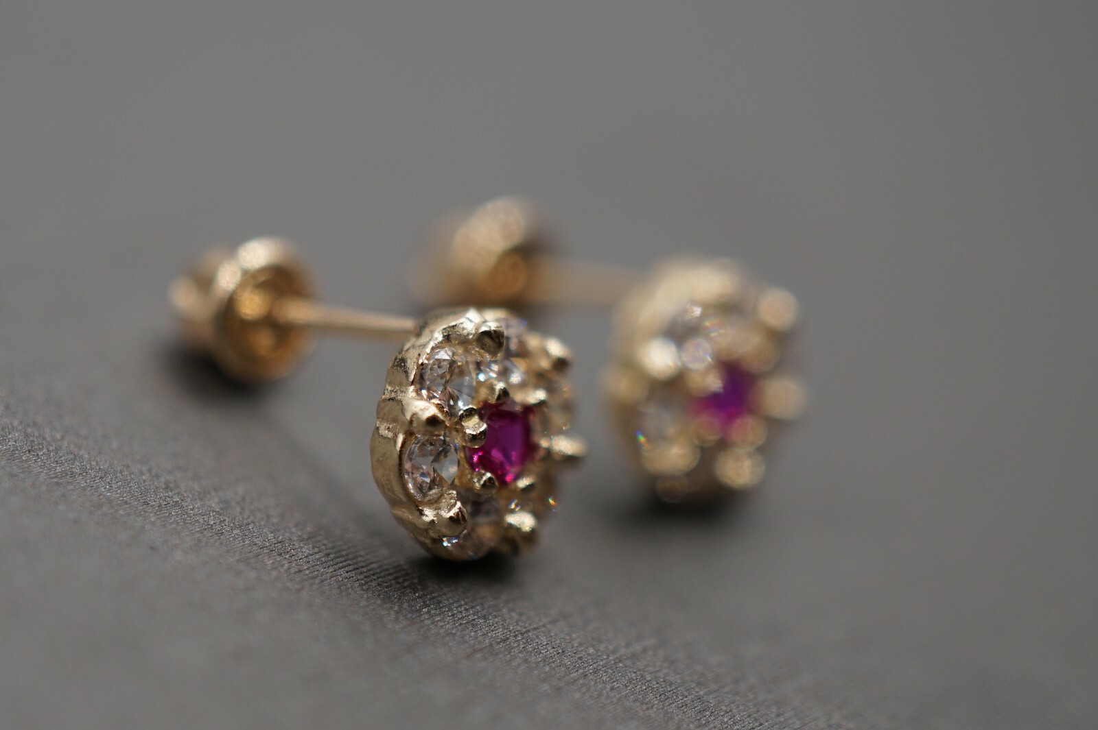14K Solid Yellow Gold 5.8MM Small Flower CZ Safety Screw Back Stud Earrings.