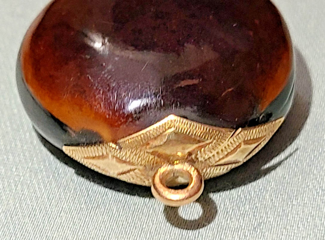 Antique Victorian polished mucuna / sea bean pendant, gold tone bail