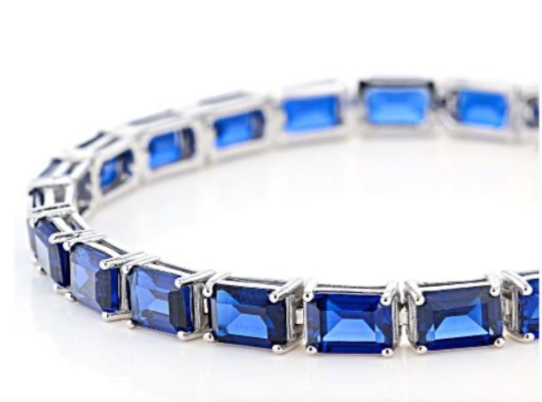 Blue Lab Created Spinel Rhodium / Sterling Silver 7.25″ tennis Bracelet 23.92ctw