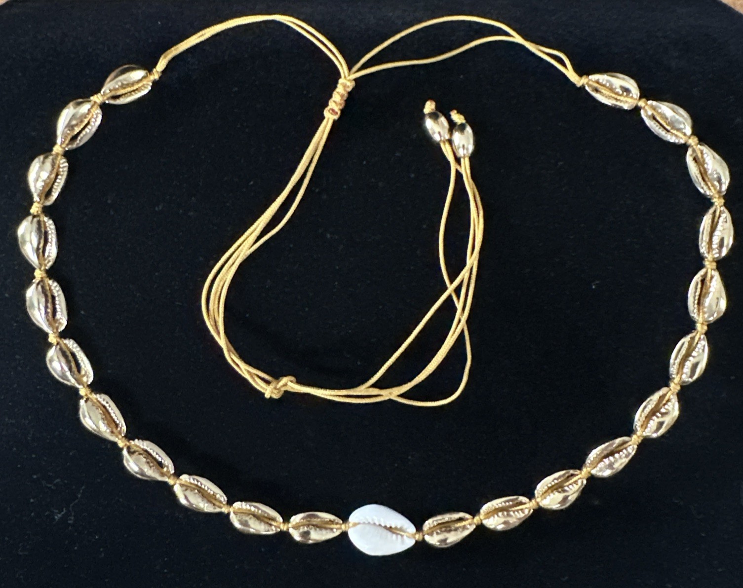 gold cowrie shell choker necklace w/ single white shell accent adjustable cord