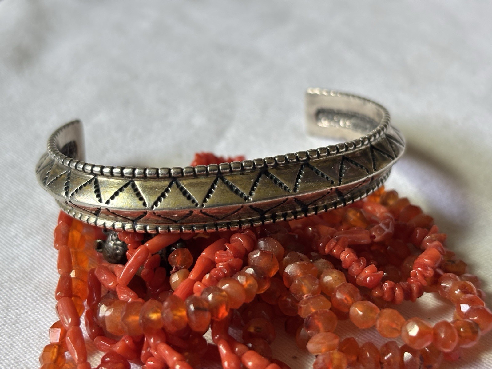 Sand cast 6.5 Navajo Sterling Silver carrinated bracelet. Patina. Signed A Kee