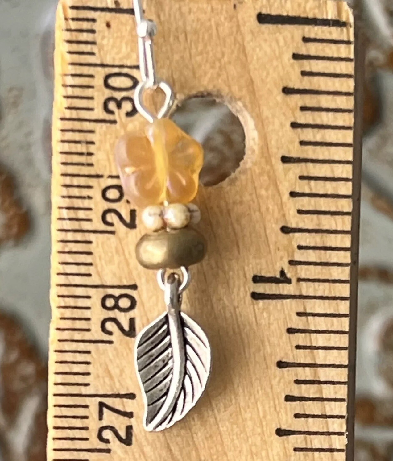 Beautiful Mixed Metal Golden Amber Flower with Silver Leaf Earrings. Bloom