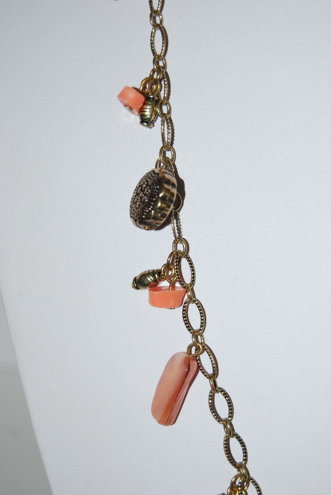 Gold Toned Metal Chain With Peach Color Stones & Charms Statement Long Necklace