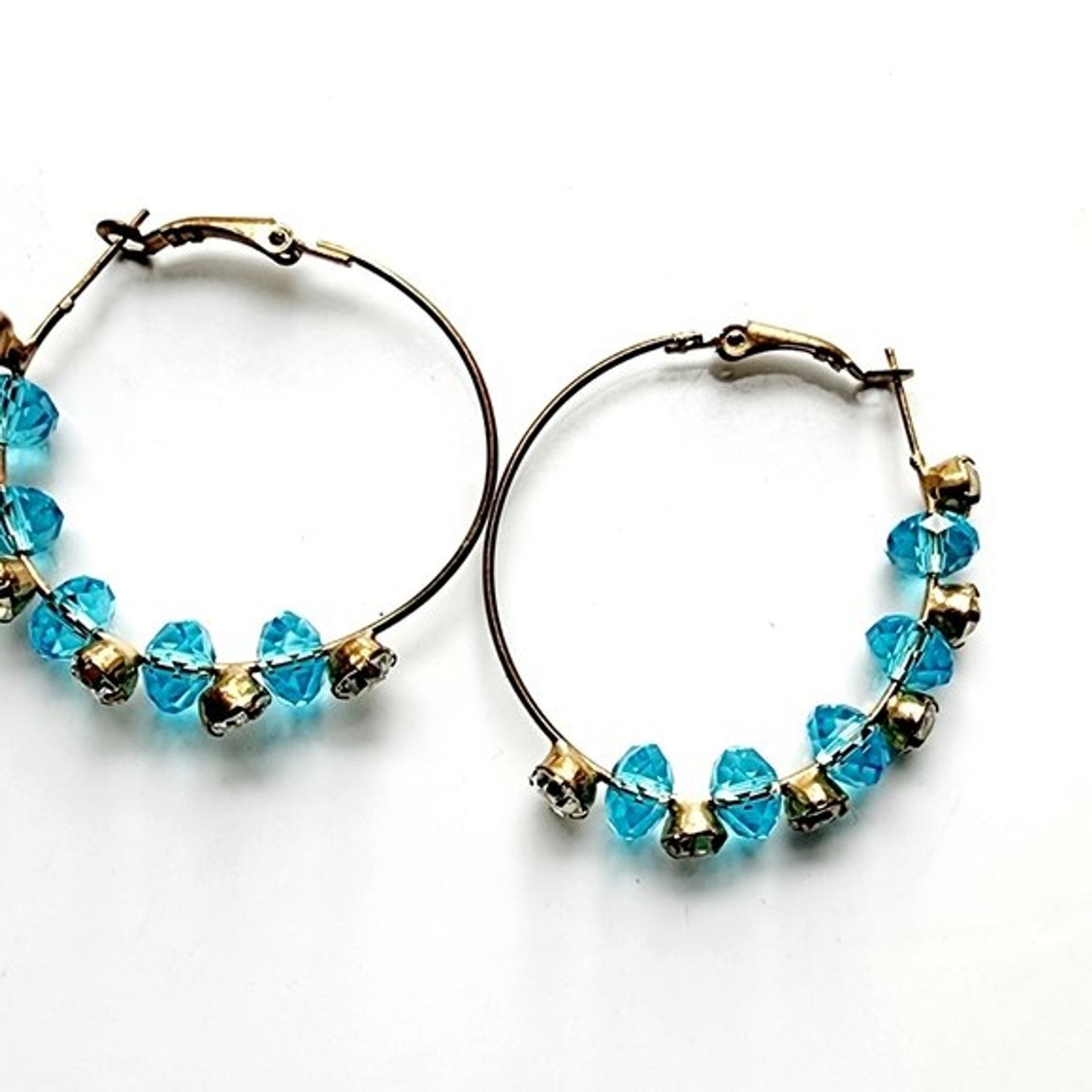 Large Bohemian wire rhinestone station hoops with brilliant blue stones