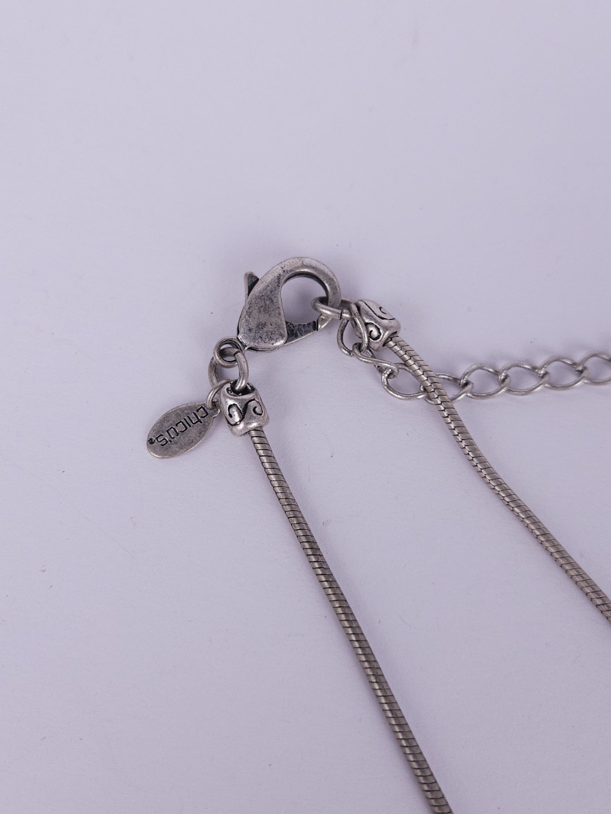 Chico’s Silvertone Peace Love Freedom Lariat Star Heart Rhinestone Necklace