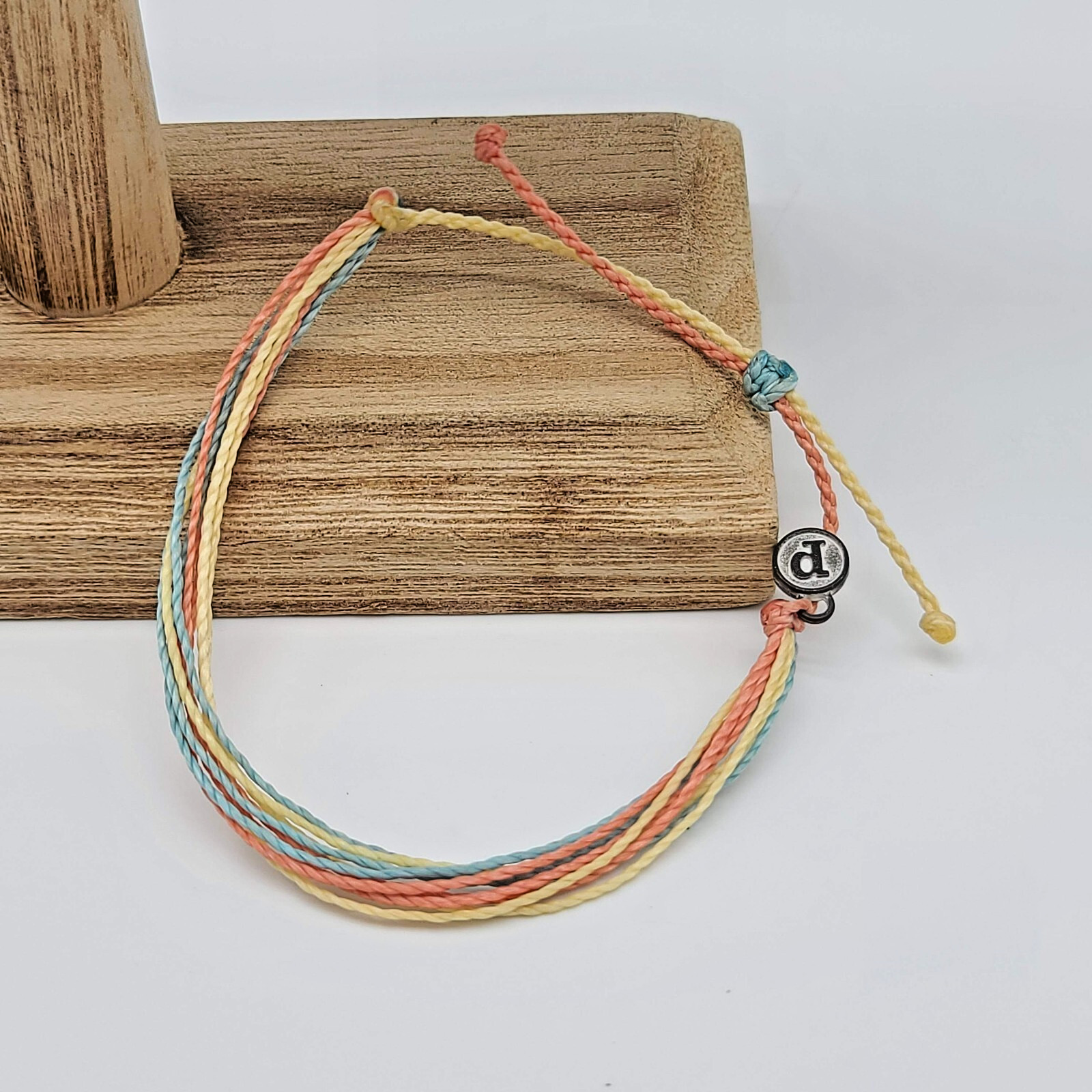 Pura Vida Original Bracelet – Butter Cream, Coral & Pacific Blue Wax-Coated Cord