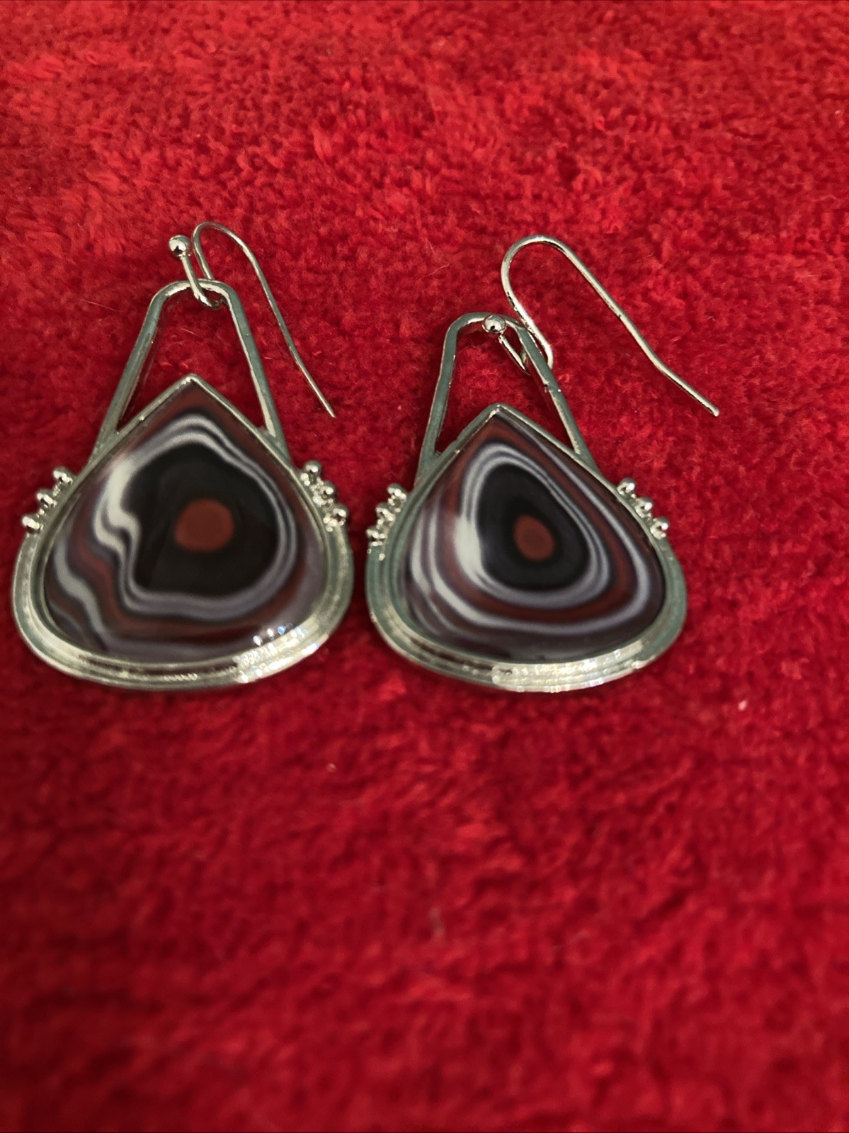 Fordite red, black and white teardrop shaped earrings