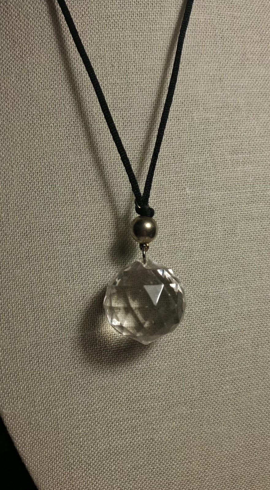No brand glass or acrylic faceted clear ball w/black knotted cord necklace