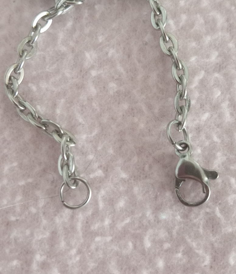 Beautiful Blue Reflective Teardrop Stone Pendant set in silver with chain