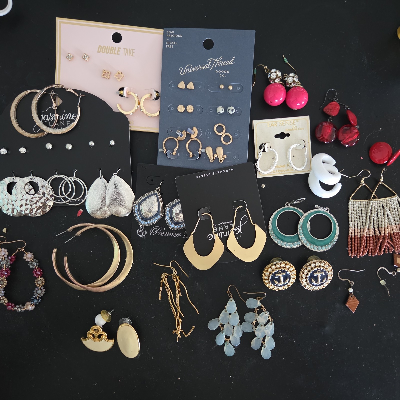 Lot of New & Used Earrings . Mixed colors and models.