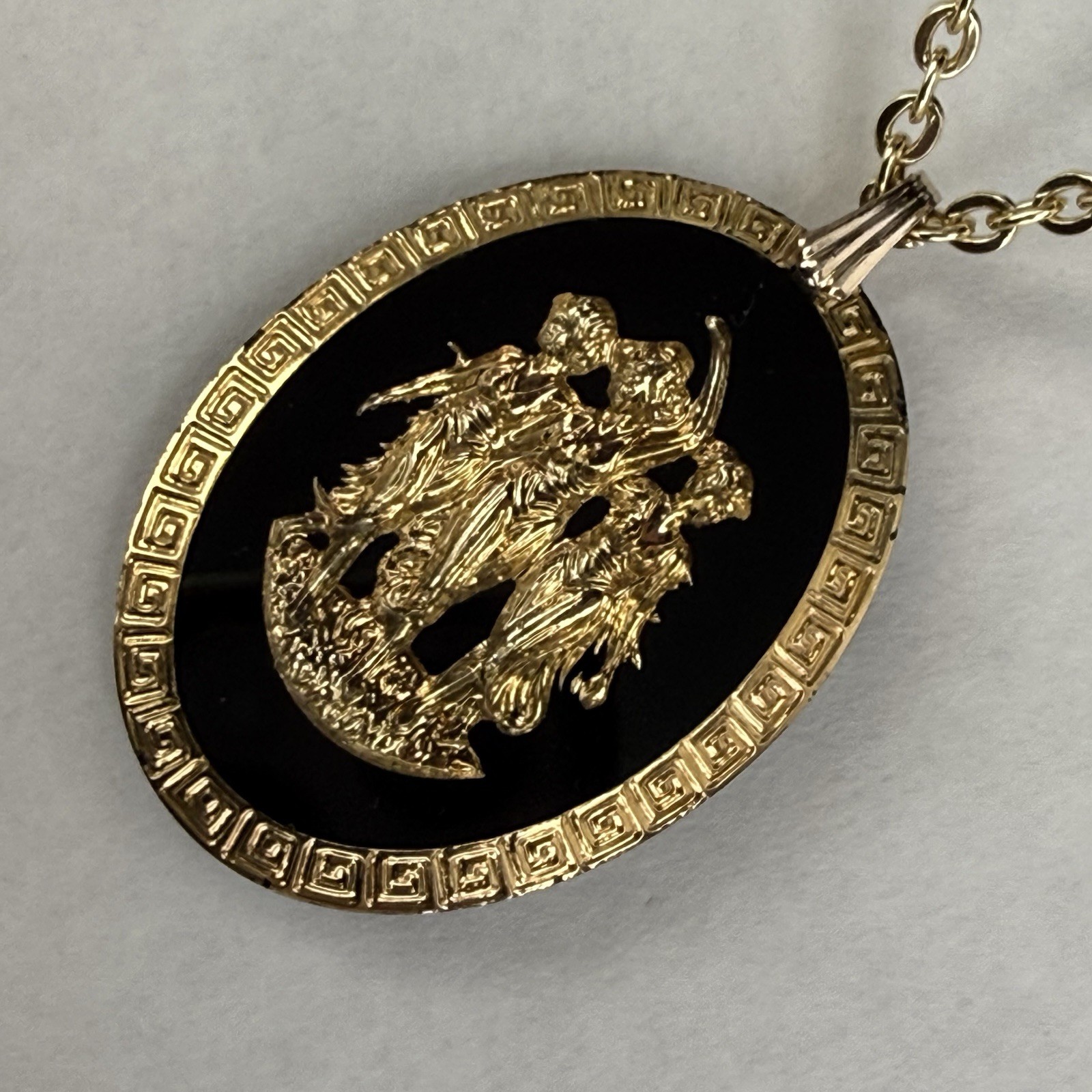 Vtg 3 Graces Pendant Necklace with Gold Tone Greek Key Rim on Black Glass 70s