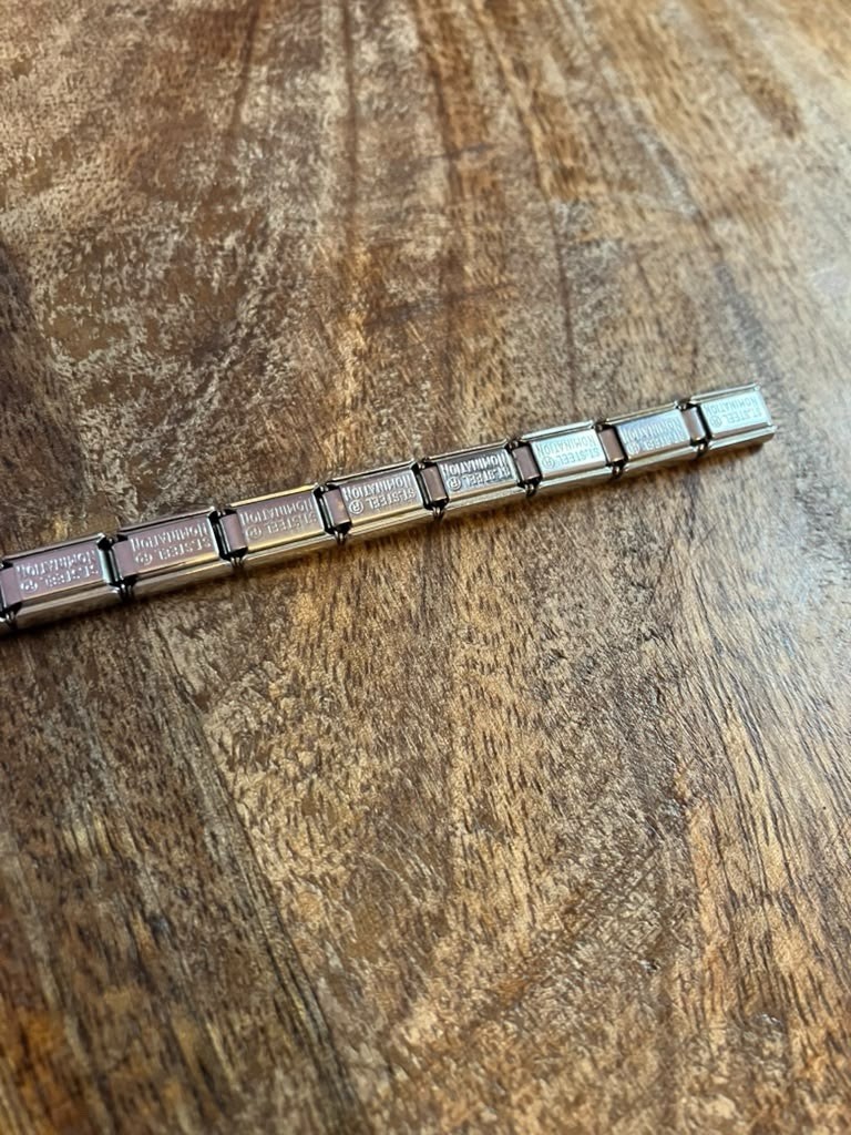 Nomination Bracelet with Four Charms Europe Italy Early 2000s Stainless Steel
