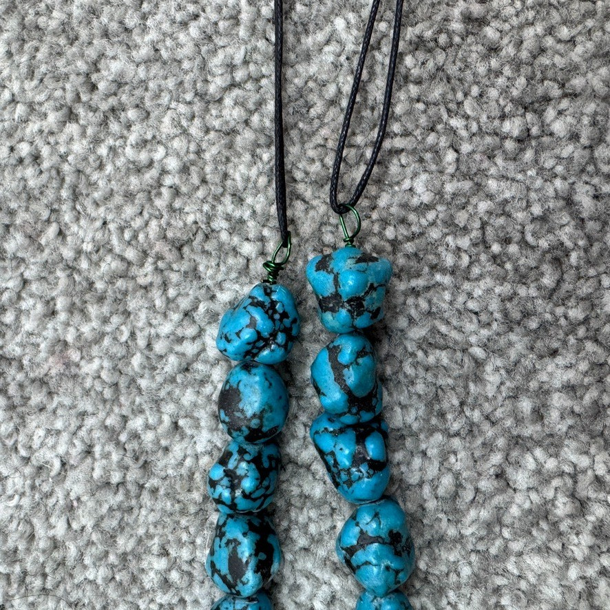Handmade Necklace With Bone Pendant Wrapped In Beading On Blue Speckled Stones