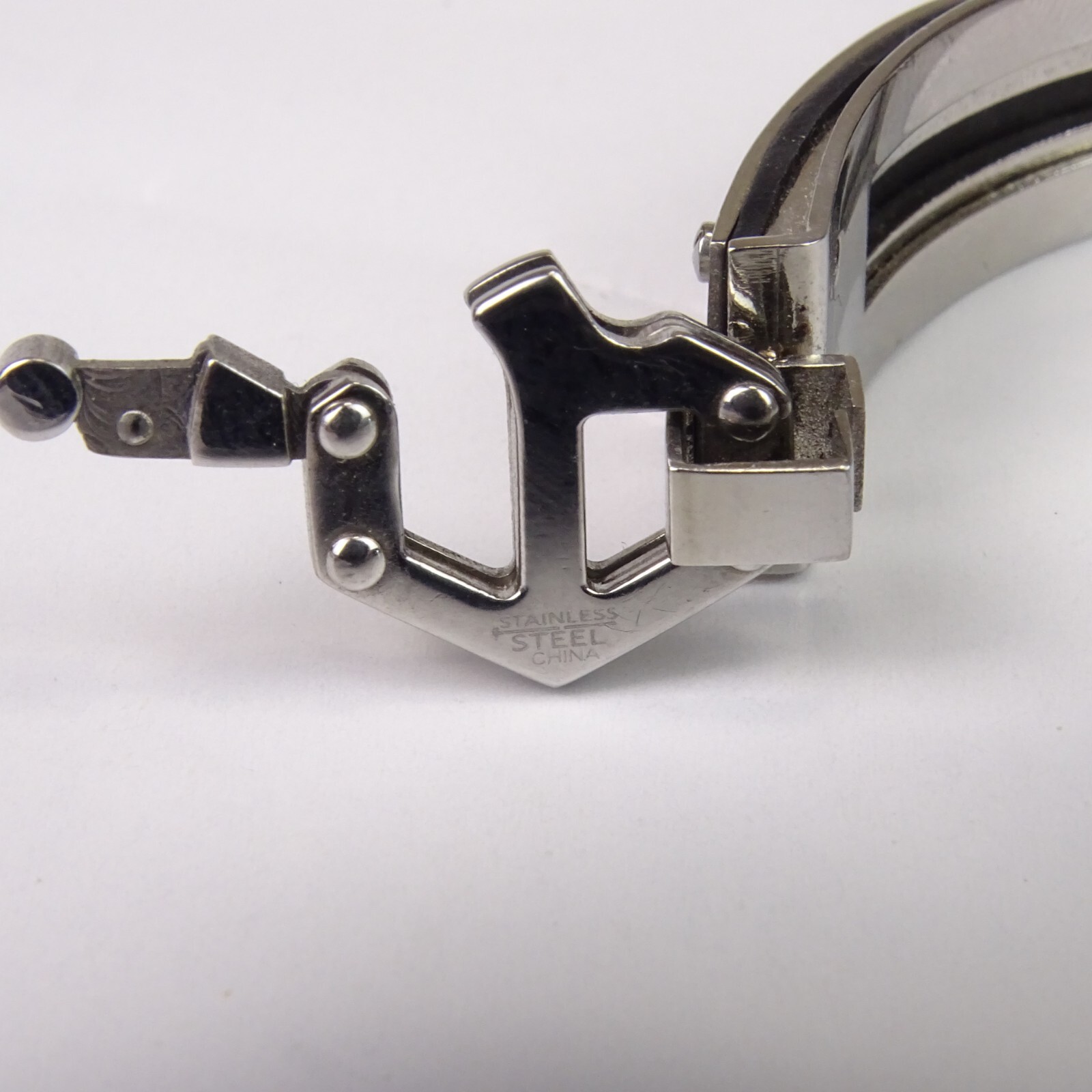 Chisel Bracelet Stainless Steel 7 1/2in Black Rubber Hinged Bangle
