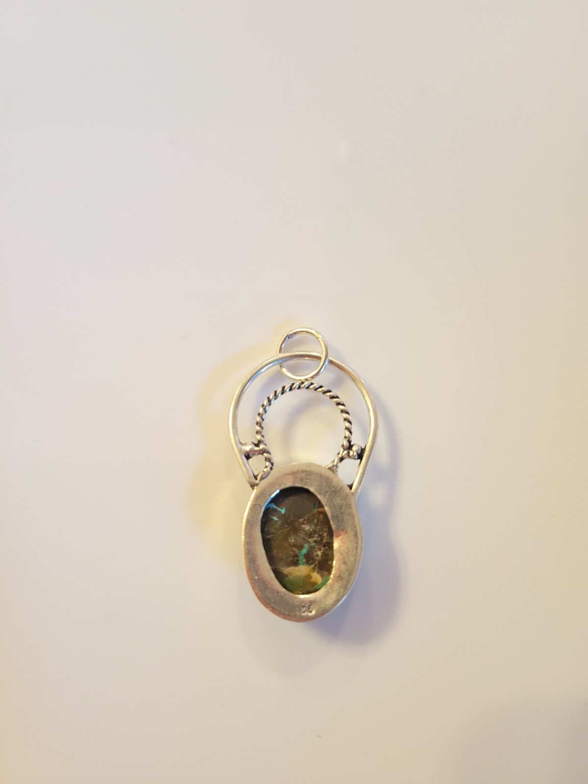 New 925 sterling silver pendant featuring an oval turquoise with Dark Matrix
