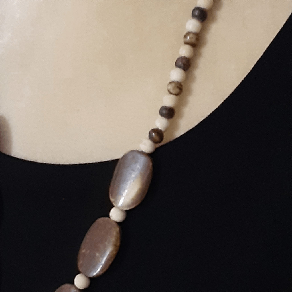 Tribal wooden beaded necklace 32″ brown cream tones