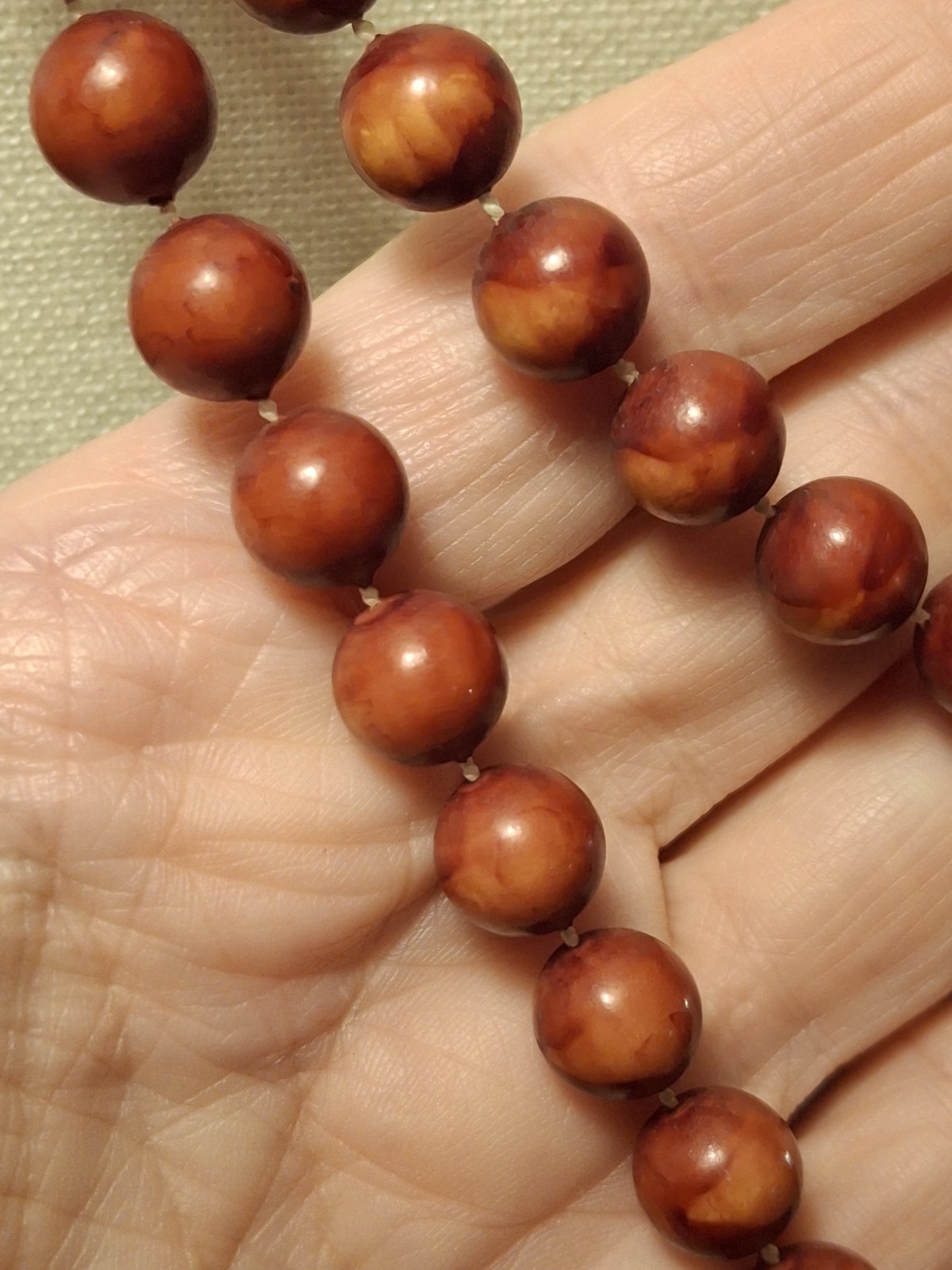 Pre-owned no brand 2 necklaces..reddish brown, orange faux wood beads