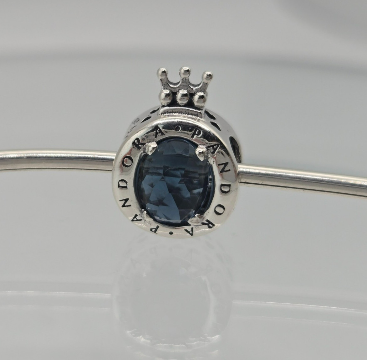 Authentic Pandora Silver Sparkling Crown “O” Blue Moments sterling Silver Charm