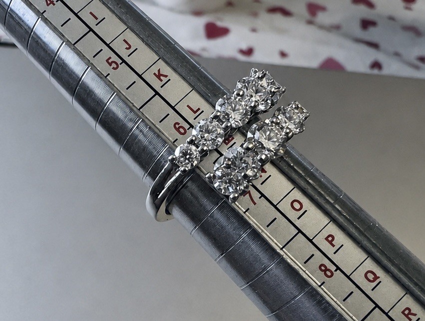 Sterling Silver and Moissanite 3.25 CT Bypass style ring. SIze 6.25.