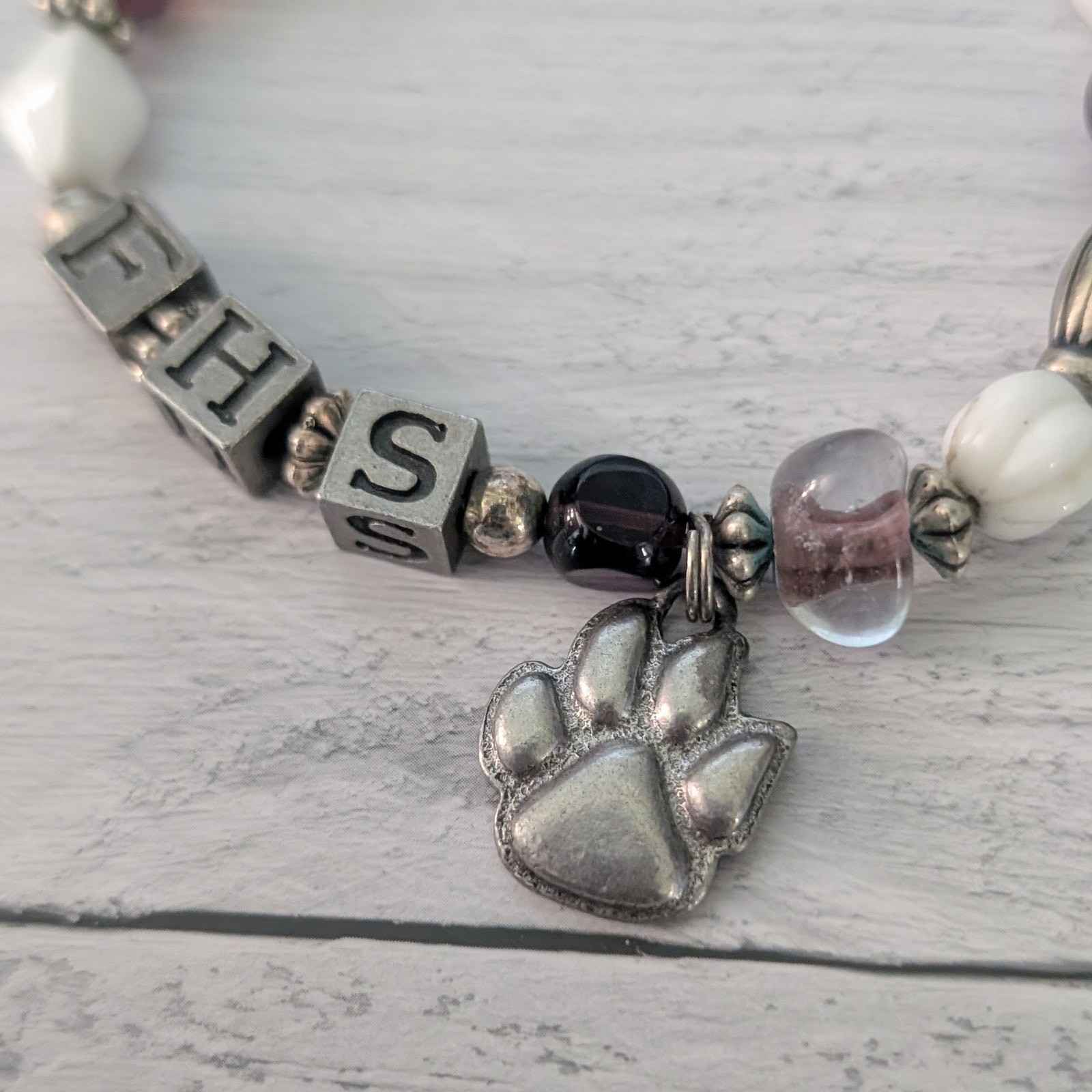 FHS with Paw Charm Stretch Bracelet – Fair Condition