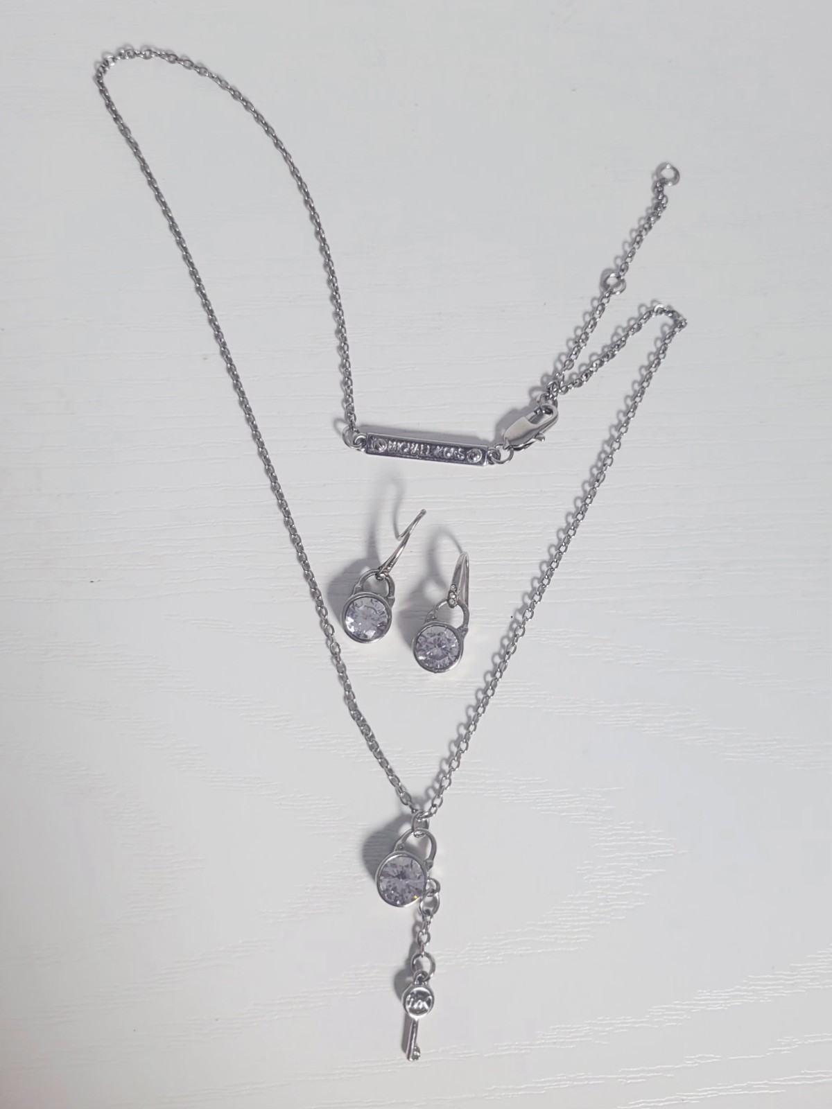 Michael Kors Silver Tone Lock & Key Necklace 22.5″ & Matching Earrings