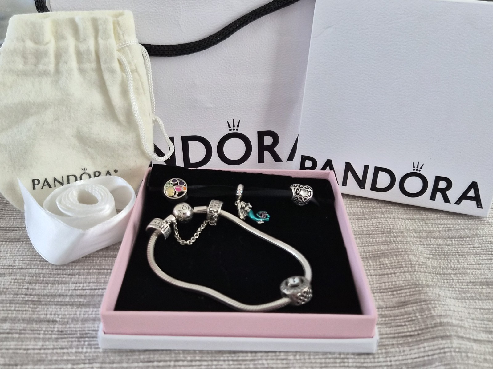 PANDORA Bracelet 7-inch with 4 Charms, Safety Chain, And Original Packaging