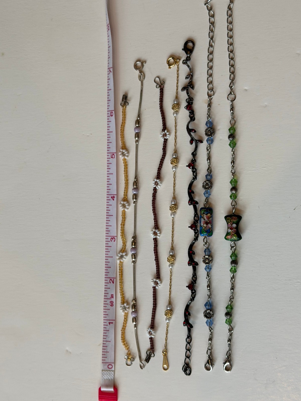 Lot of 7 Thin, Delicate Floral Bead Bracelets, from 6.5″ to 8.5″,