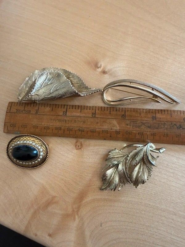 Four Vintage Designer Brooches – Sphinx, Lisner, Sarah Coventry and Jewelcraft