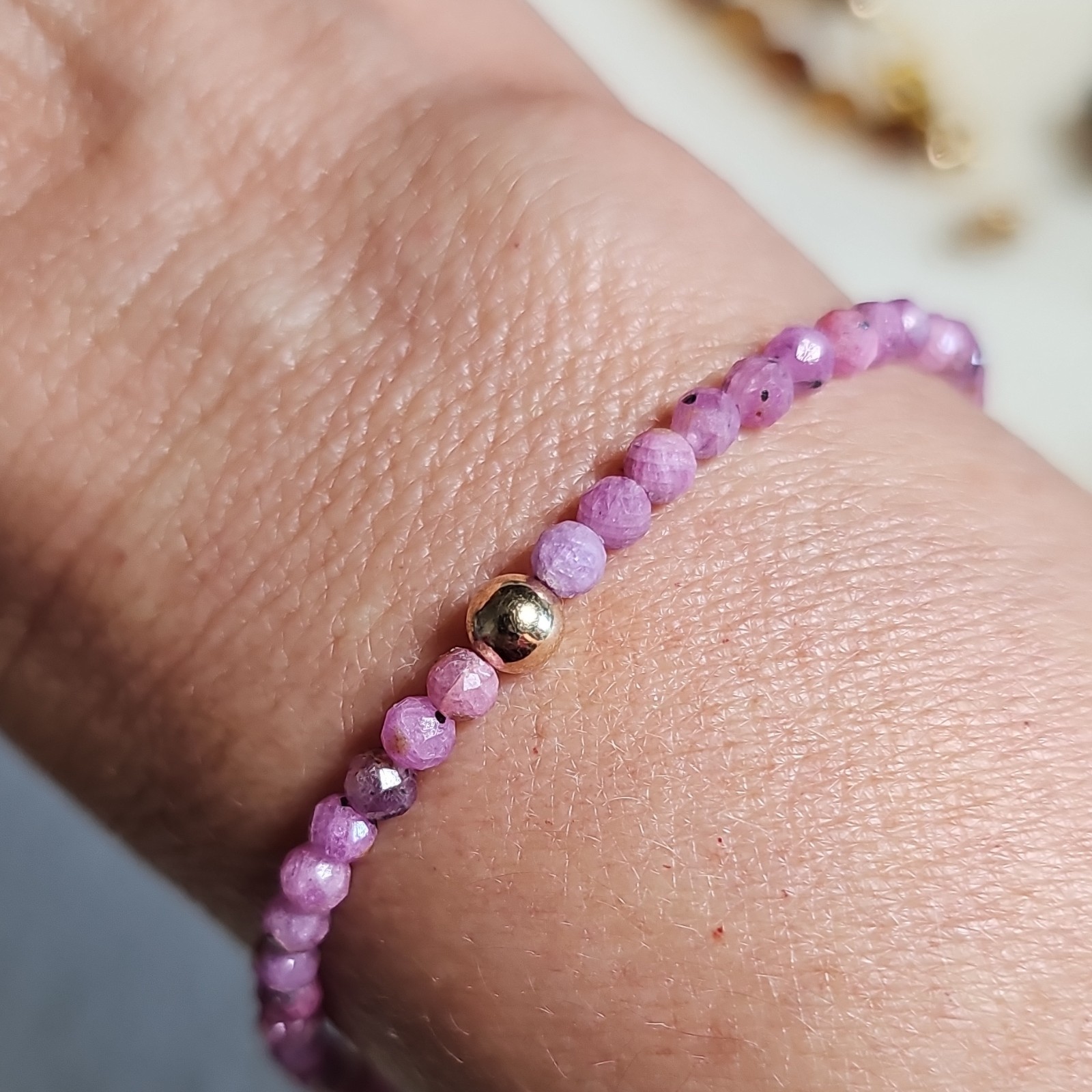 Faceted Ruby Beads Bracelet Round Beads with 10kt Gold Spacer Bead Stretchy