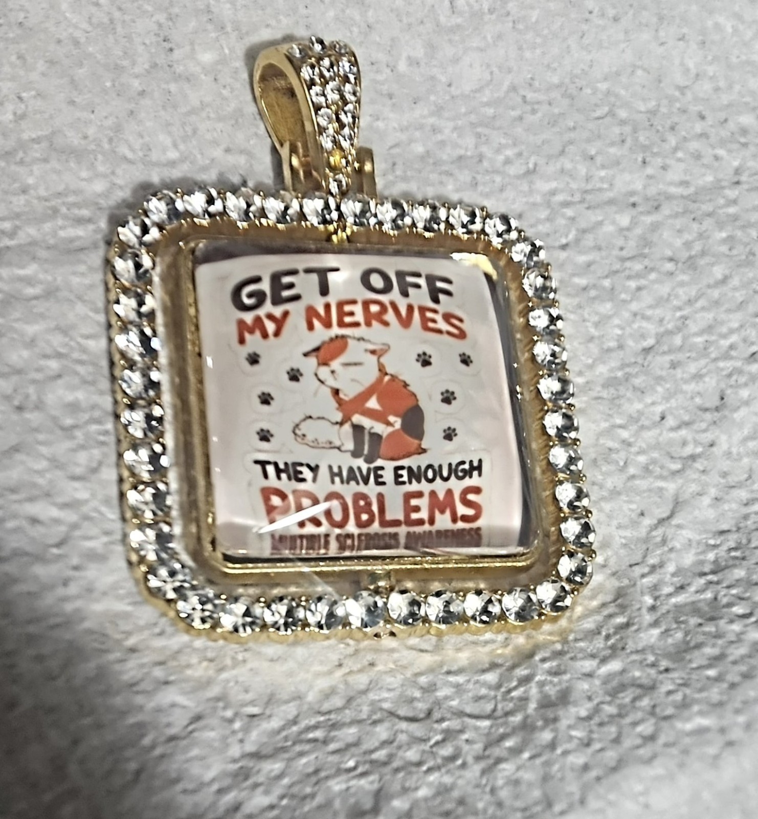 Square White Crystal Pavé Border Charm Pendant, Awareness, “GET OFF MY NERVES”
