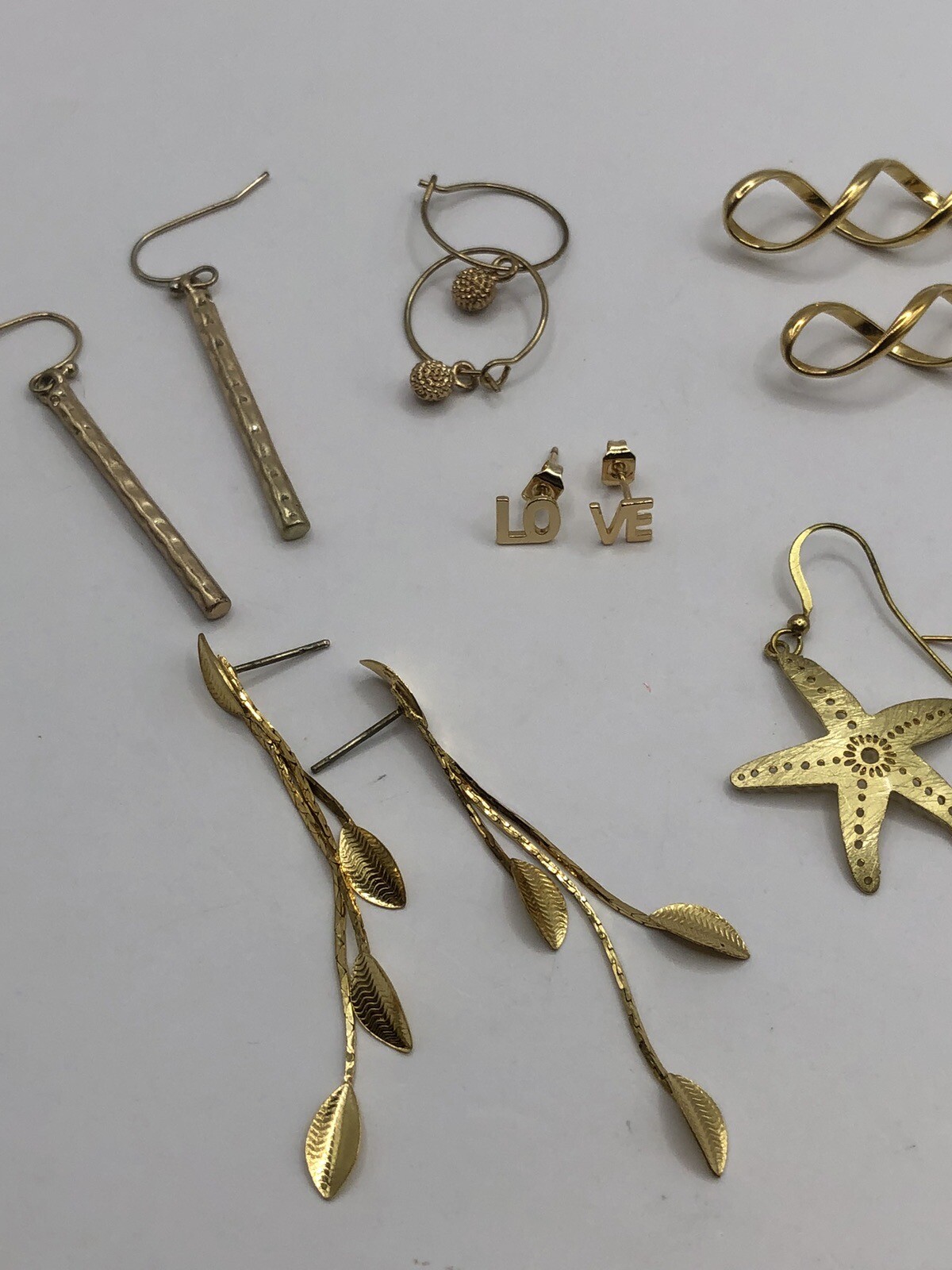 Set Of 8 Gold Tone Earrings Starfish Twist Hoops Dangles Love Stars Pierced