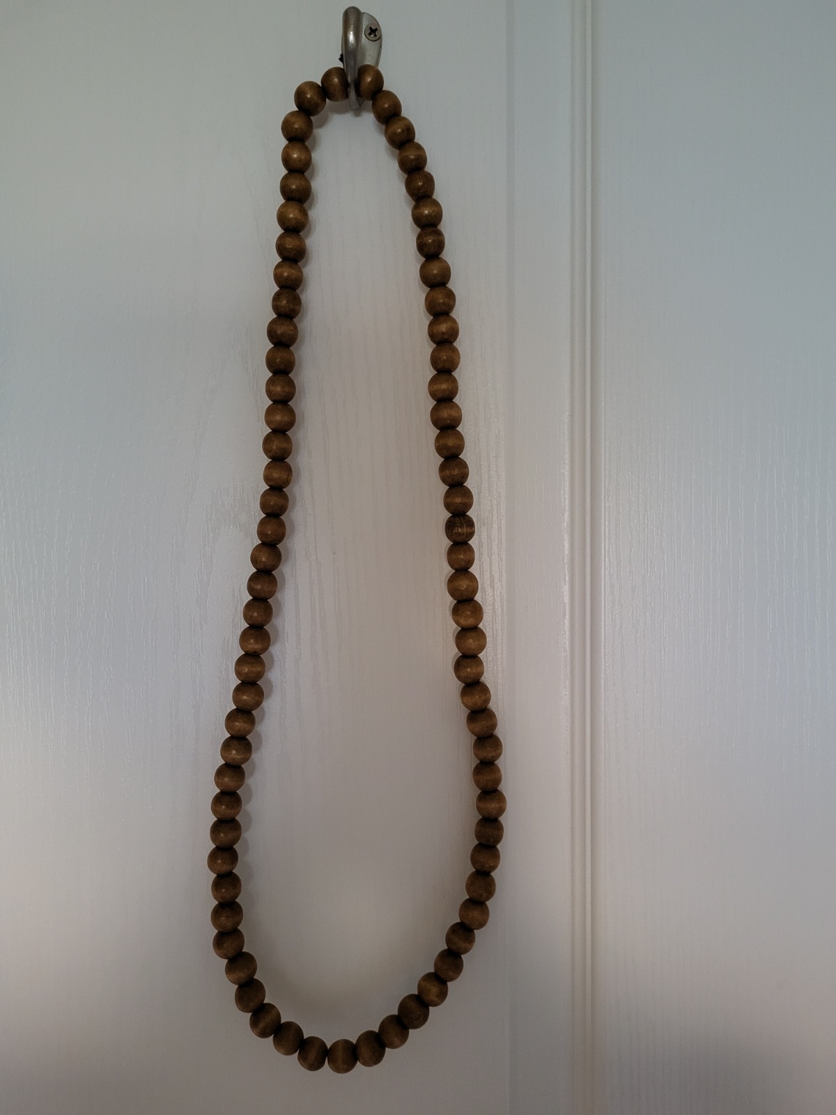 Long wooden bead necklace made of light brown beads 37in