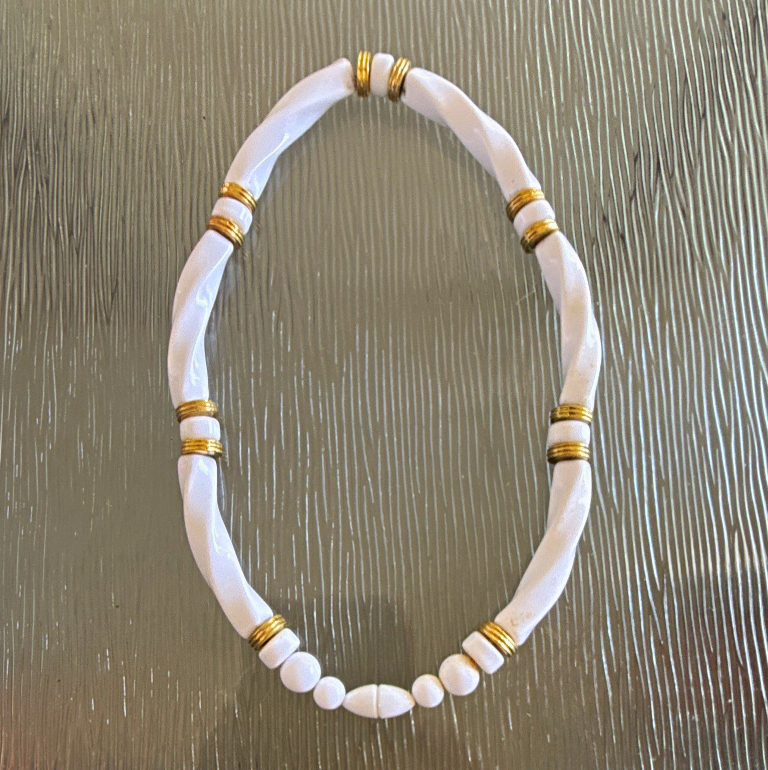 White Plastic Beaded Necklace with Gold-Tone Accents/Spacers