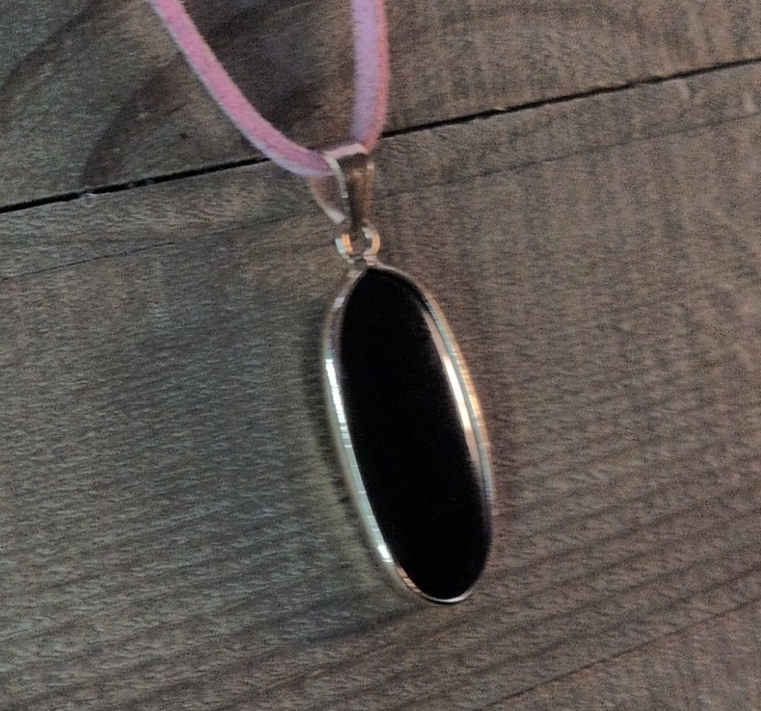 Bezel-Set Oval Black Onyx Charm Pendant Necklace on Pink Cord, Silver Tone