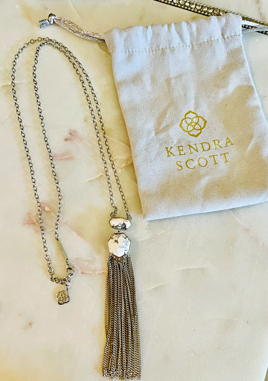 Kendra Scott Tae Long Necklace, Silver with a white howlite pendant and tassel